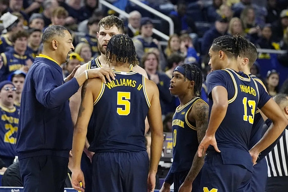 Juwan Howard, Hunter Dickinson (1), Terrance Williams II (5), Dug McDaniel (0), Joey Baker (15), and Jett Howard (13)