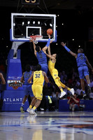 Tarris Reed Jr. (32) and Nimari Burnett (4)