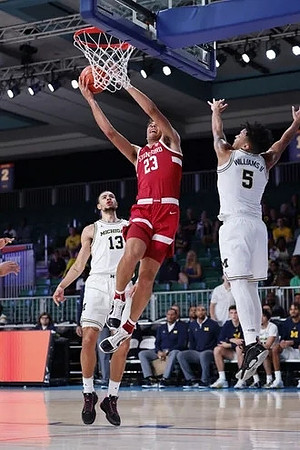 Olivier Nkamhoua (13) and Terrance Williams II (5)