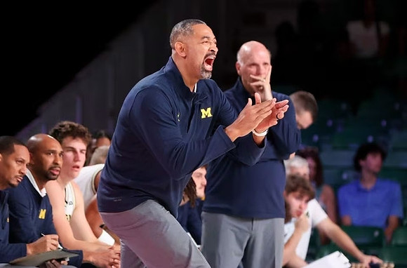 Juwan Howard, Phil Martelli, and Michigan Team