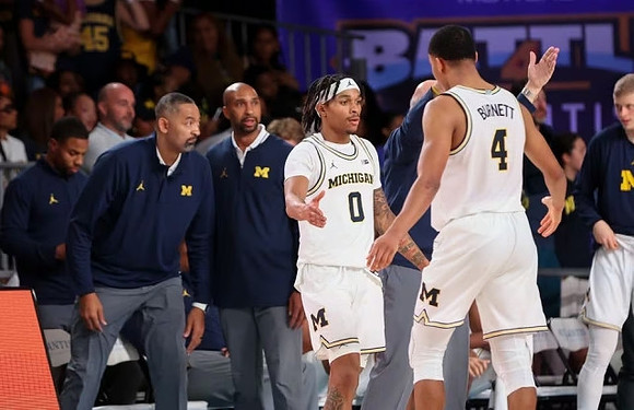 Juwan Howard, Saddi Washington, Dug McDaniel (0), and Nimari Burnett (4)