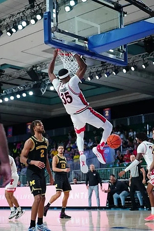 Tray Jackson (2) and Olivier Nkamhoua (13)