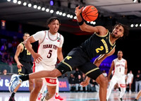 Olivier Nkamhoua (13) and Tray Jackson (2)