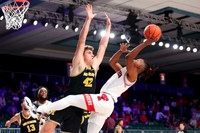 Olivier Nkamhoua (13) and Will Tschetter (42)
