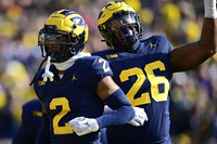Will Johnson (2) and Rayshaun Benny (26)