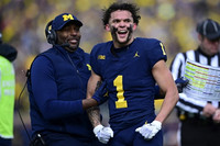 Sherrone Moore and Roman Wilson (1)