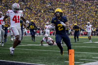 Drake Nugent (60), Trente Jones (53), Blake Corum (2), and LaDarius Henderson (73)