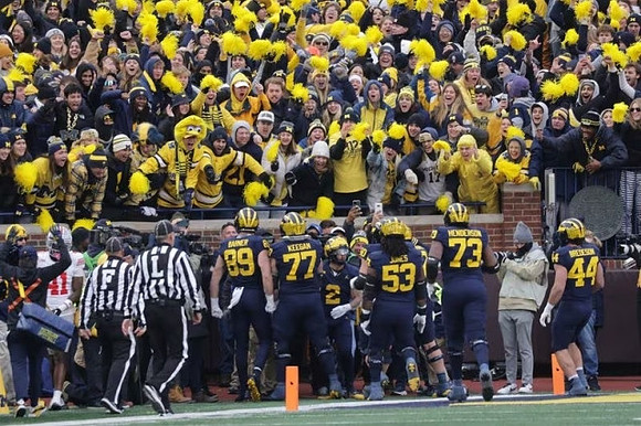 AJ Barner (89), Trevor Keegan (77), Blake Corum (2), Trente Jones (53), LaDarius Henderson (73), and Max Bredeson (44)