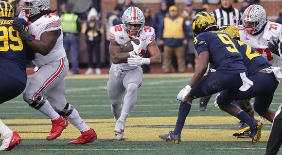 Cam Goode (99) and Rod Moore (9)