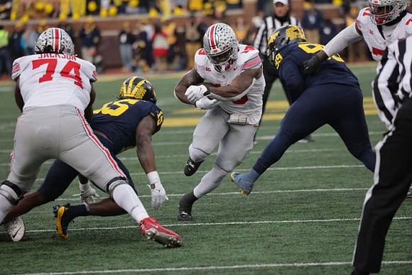 Ernest Hausmann (15) and Cam Goode (99)
