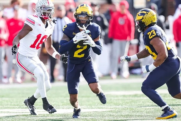 Will Johnson (2) and Michael Barrett (23)