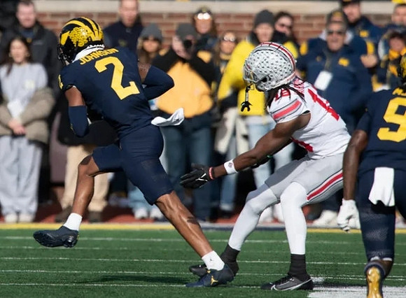 Will Johnson (2) and Rod Moore (9)