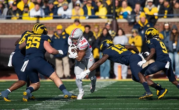 Mason Graham (55), Ernest Hausmann (15), and Rod Moore (9)