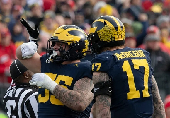 Mason Graham (55) and Braiden McGregor (17)