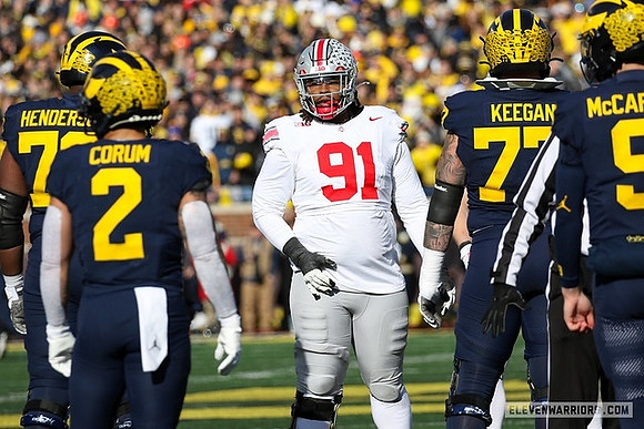 LaDarius Henderson (73), Blake Corum (2), Trevor Keegan (77), and J.J. McCarthy (9)