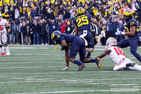 Rod Moore (9), Junior Colson (25), and Michael Barrett (23)