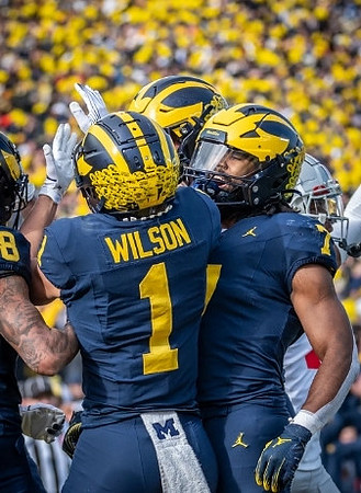 Roman Wilson (1) and Donovan Edwards (7)