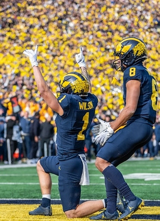 Roman Wilson (1) and Tyler Morris (8)