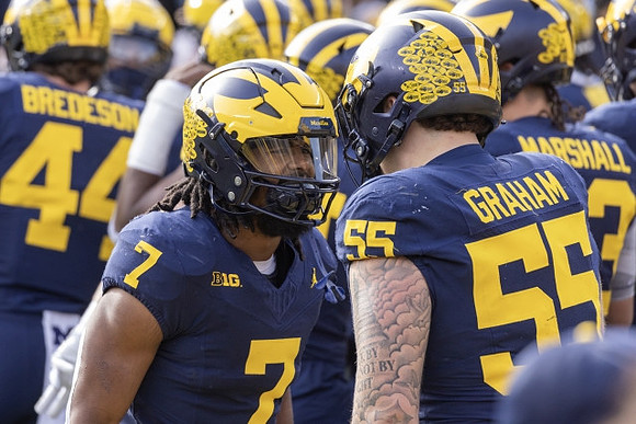 Max Bredeson (44), Donovan Edwards (7), Mason Graham (55), and Zack Marshall (83)