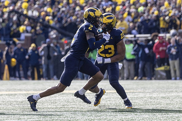 Will Johnson (2) and Michael Barrett (23)