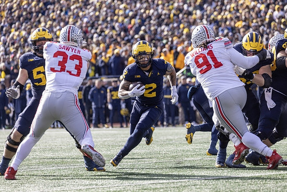 Karsen Barnhart (52) and Blake Corum (2)