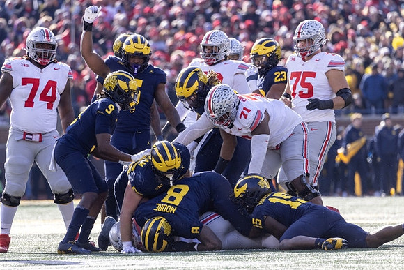 Rod Moore (9), Josaiah Stewart (5), Derrick Moore (8), Mason Graham (55), Ernest Hausmann (15), and Michael Barrett (23)