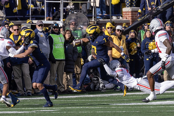 Tyler Morris (8) and Donovan Edwards (7)