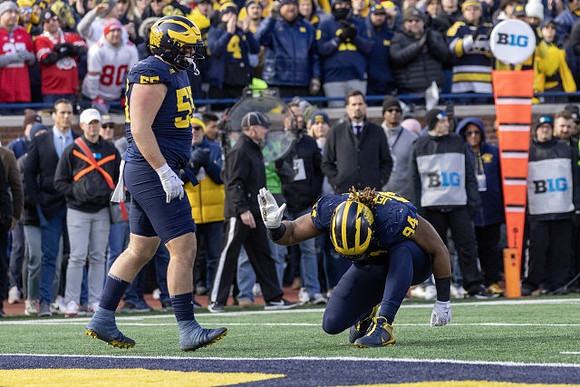 Mason Graham (55) and Kris Jenkins (94)
