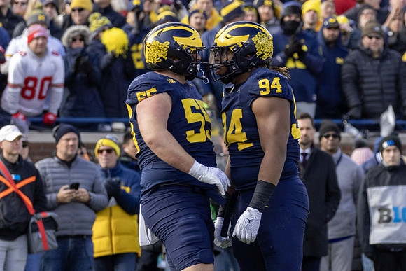 Mason Graham (55) and Kris Jenkins (94)