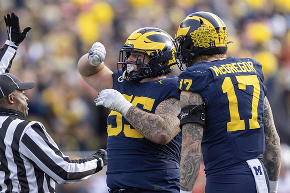 Mason Graham (55) and Braiden McGregor (17)