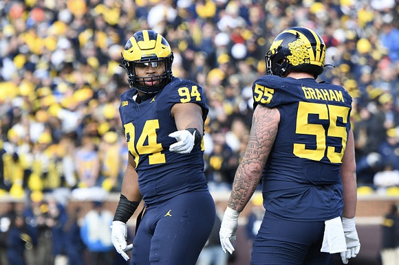 Kris Jenkins (94) and Mason Graham (55)