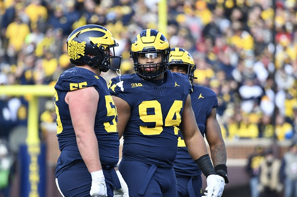 Mason Graham (55) and Kris Jenkins (94)