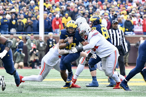 Alex Orji (10) and Drake Nugent (60)