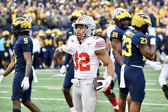 Rod Moore (9), Ernest Hausmann (15), and Michael Barrett (23)