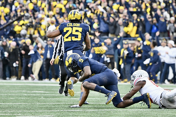 Junior Colson (25) and Rod Moore (9)