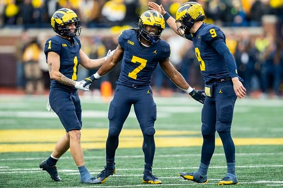 Roman Wilson (1), Donovan Edwards (7), and J.J. McCarthy (9)