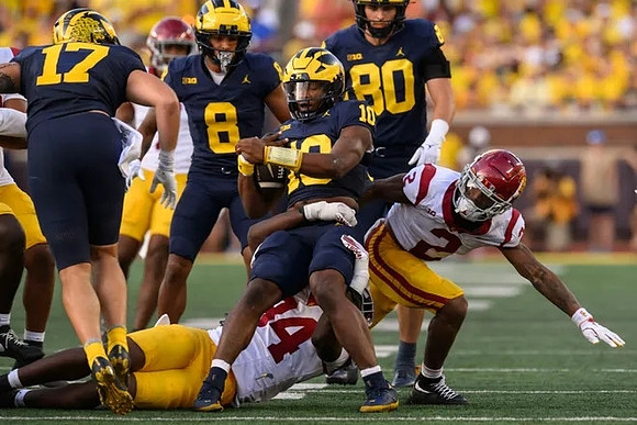 Marlin Klein (17), Tyler Morris (8), Alex Orji (10), and Hogan Hansen (80)