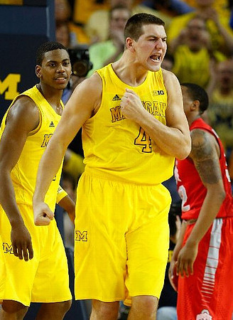 Glenn Robinson III (1) and Mitch McGary (4)