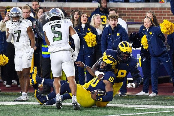 Alex Orji (10) and Myles Hinton (78)