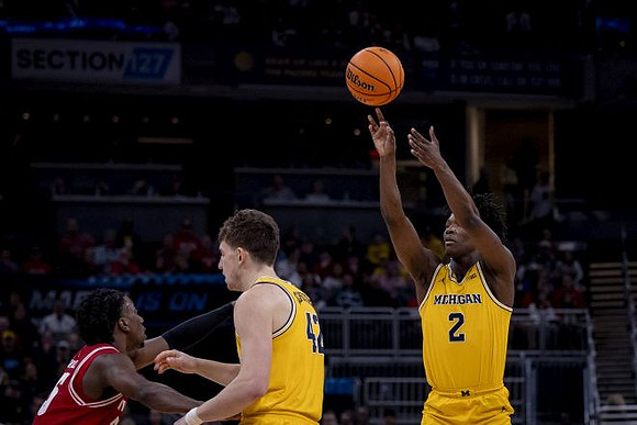 L.J. Cason (2) and Will Tschetter (42)