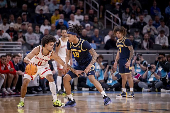 Rubin Jones (15) and Tre Donaldson (3)