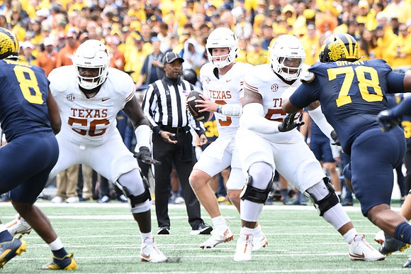 Derrick Moore (8) and Kenneth Grant (78)