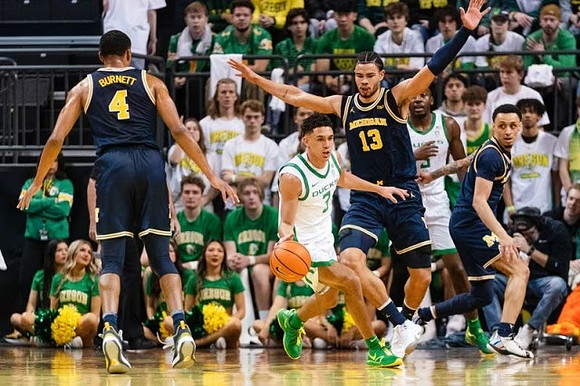 Nimari Burnett (4), Olivier Nkamhoua (13), and Jaelin Llewellyn (3)