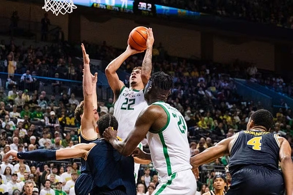 Will Tschetter (42), Olivier Nkamhoua (13), and Nimari Burnett (4)