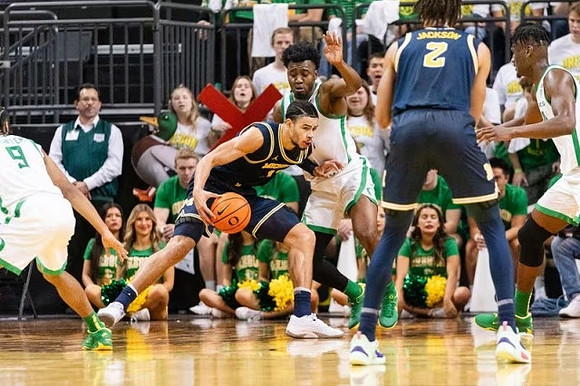 Olivier Nkamhoua (13) and Tray Jackson (2)