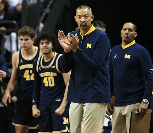 Will Tschetter (42), George Washington III (40), Juwan Howard, and Howard Eisley