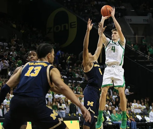 Olivier Nkamhoua (13), Nimari Burnett (4), and Tarris Reed Jr. (32)