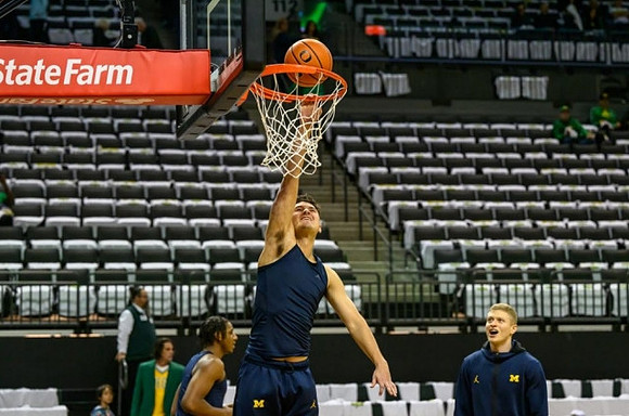 Ian Burns (14), Youssef Khayat (24), and Tarris Reed Jr. (32)