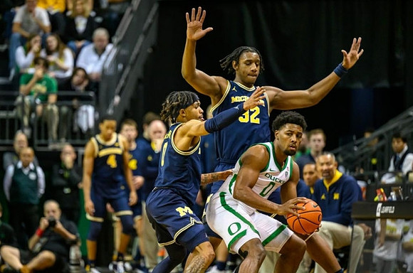 Dug McDaniel (0) and Tarris Reed Jr. (32)