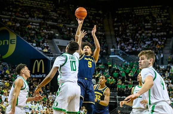 Terrance Williams II (5) and Tarris Reed Jr. (32)